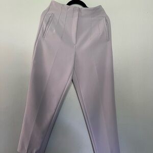 Zara. Two high waisted trousers.